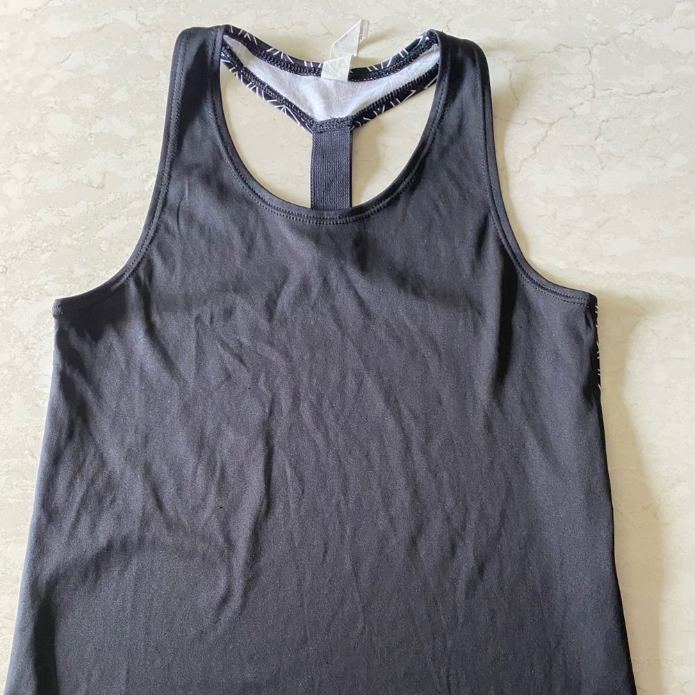Under Armour girl’s black tank top size small